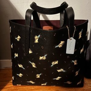 coach tote never used. The design on the bag is owls. no stains, no dama…